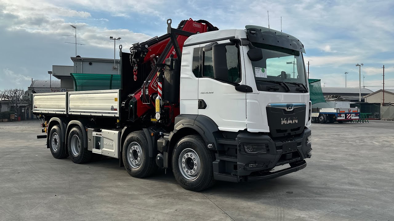 MAN TGS 35.520  quattro assi con cassone ribaltabile e gru FASSI
