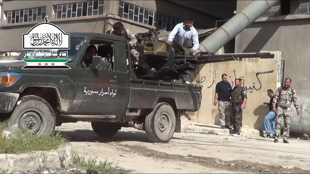 Anti-aircraft gun ZU 23-2 on the basis of a pickup truck is firing direct fire
