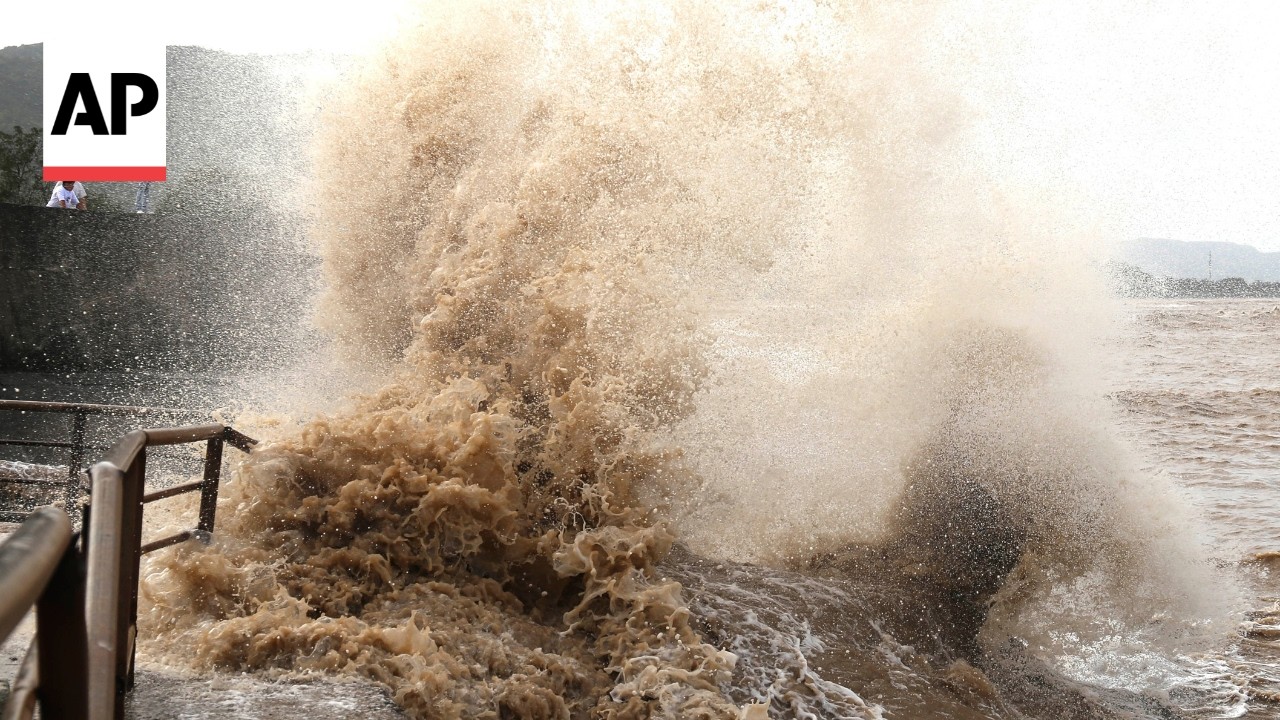 Huge waves slam into windows as Typhoon Bavi hits China