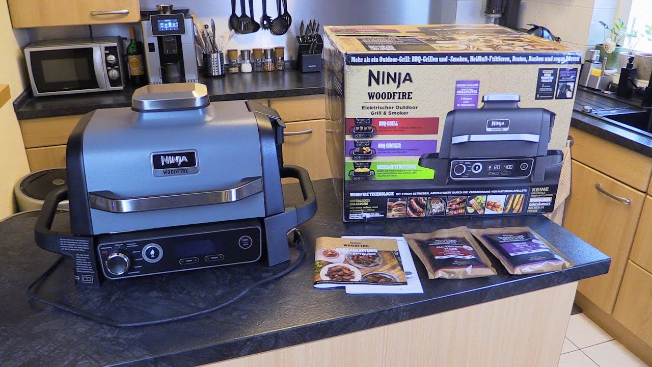 Ninja Woodfire Outdoor Grill & Smoker und Heißluftfritteuse, 7 Kochfunktionen, Räuchern, BBQ, ...