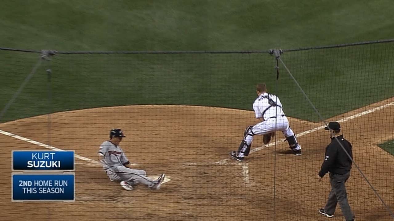 Kurt Suzuki races around the bases for an inside-the-park home run