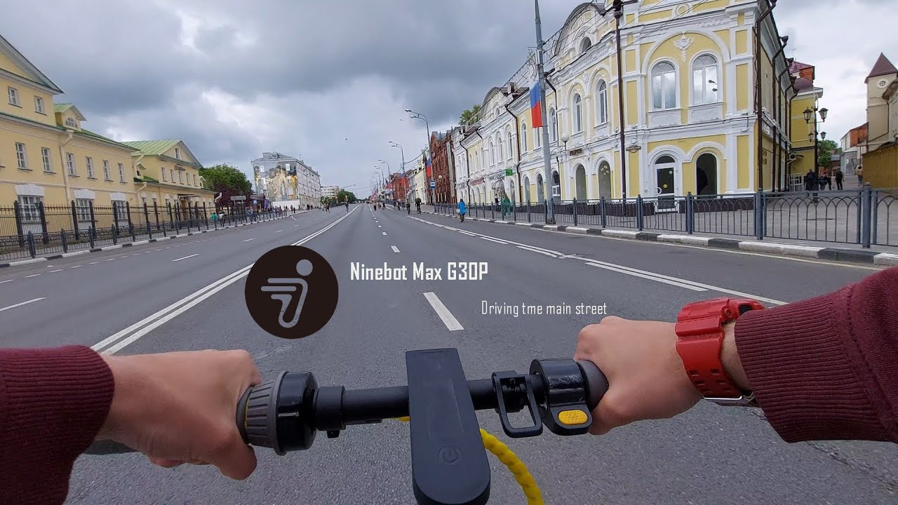 Electric Scooter Ninebot Max G30P, driving through the main street