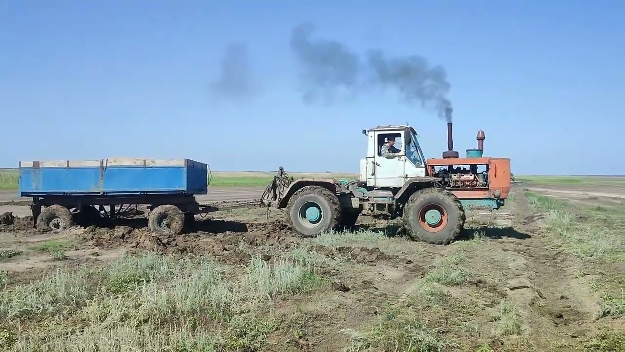 Т-150к.посадили телегу в солонцах.