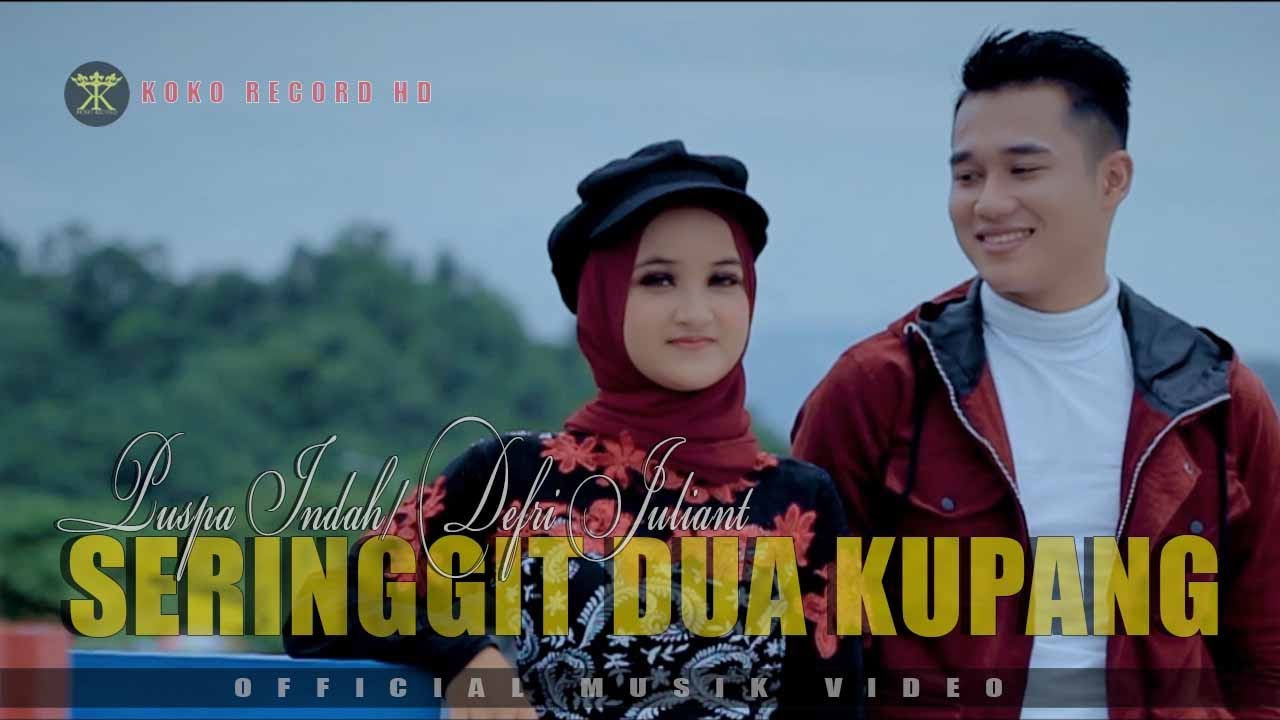 DEFRI JULIANT FT PUSPA INDAH - SERINGGIT DUA KUPANG (OFFICIAL MUSIC VIDEO)