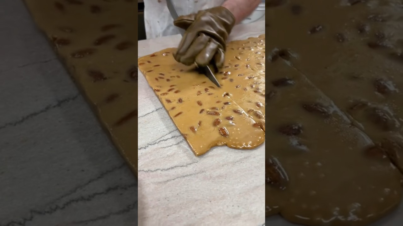 English Toffee 😍🍫 buttery nutty goodness dipped in chocolate & more almonds!