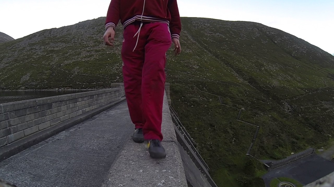 Walking along dam wall at silent valley Kilkeel