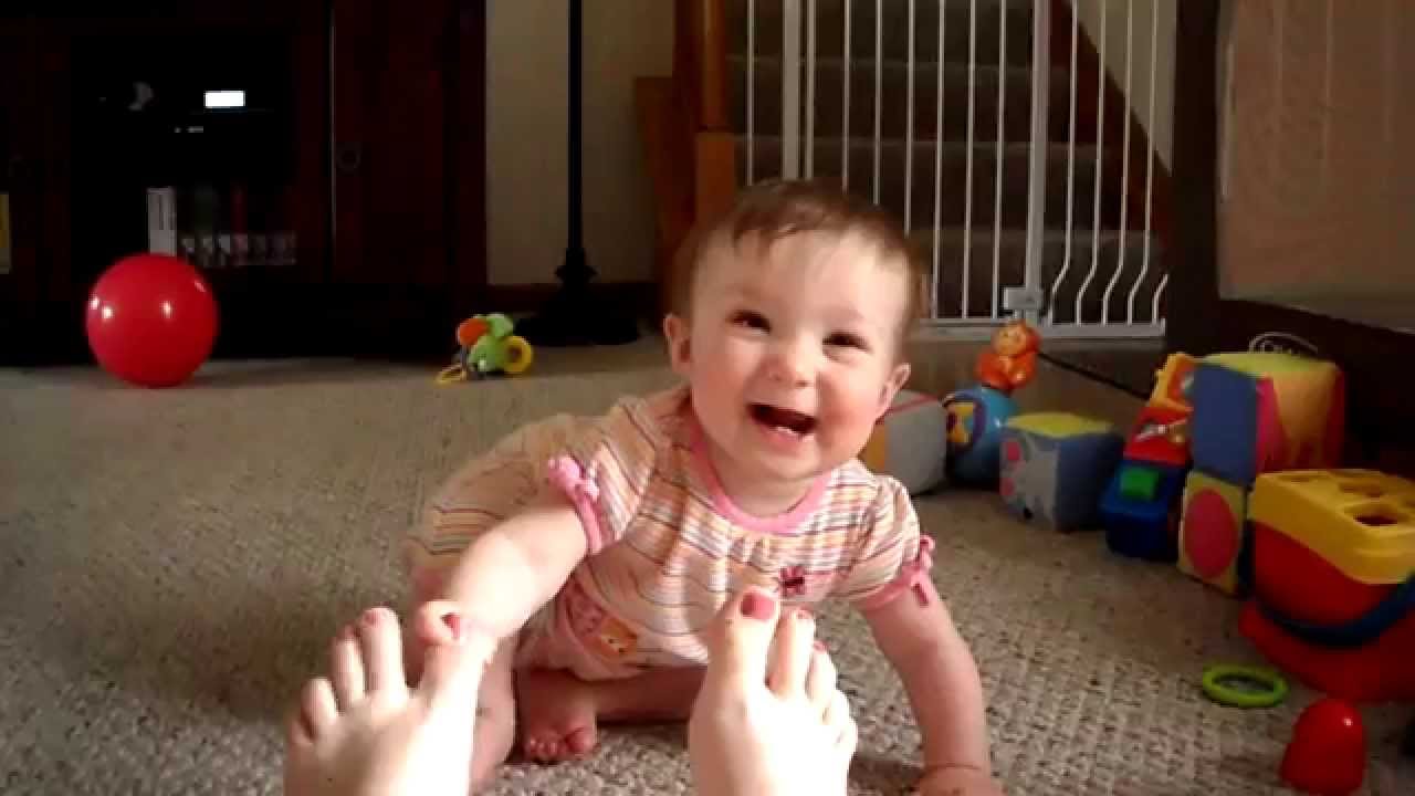 Toes are funny - Annika laughing at Mommy's toes