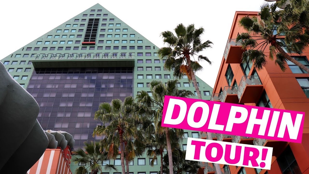The Dolphin Hotel - Tour the BEAUTIFUL and VIBRANT Walt Disney World Dolphin Hotel!