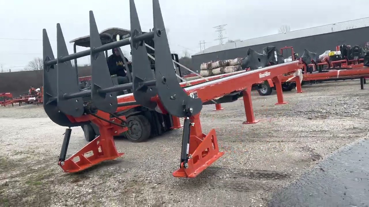 Trip to Woodmizer for a log deck. Watch for a non American special mill!