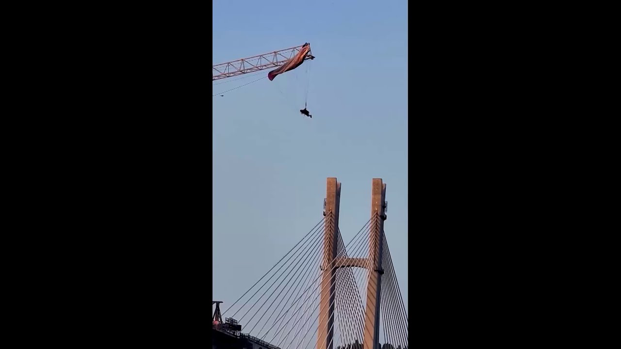 Paraglider left hanging 60 meters high for over 3 hours in China