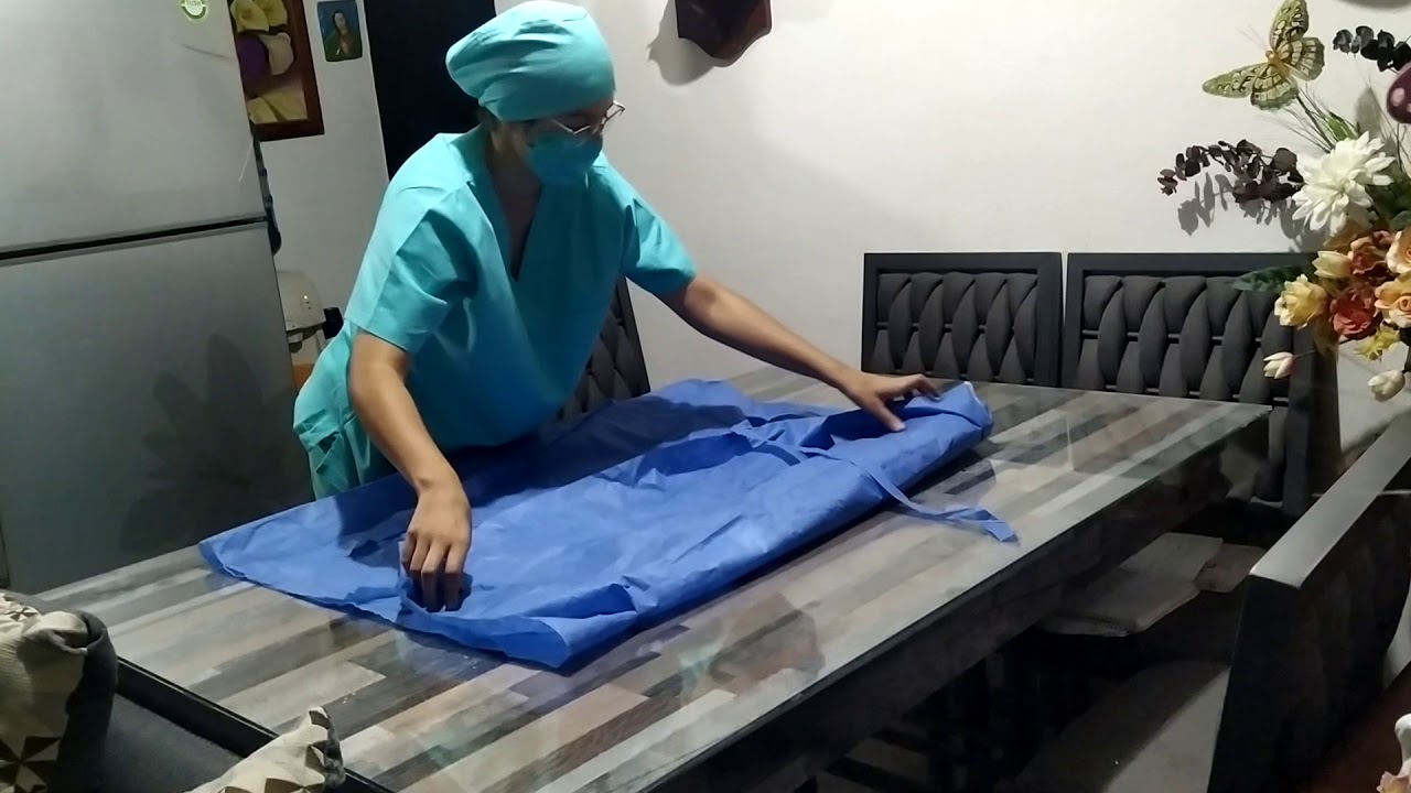 DOBLADO DE BATA QUIRURGICA