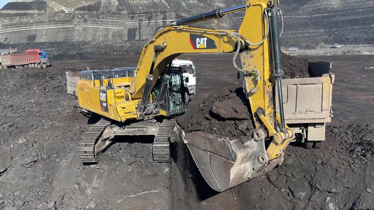 Caterpillar 352F Excavator Loading Mercedes & Man Trucks With Coal - Ascon Ltd