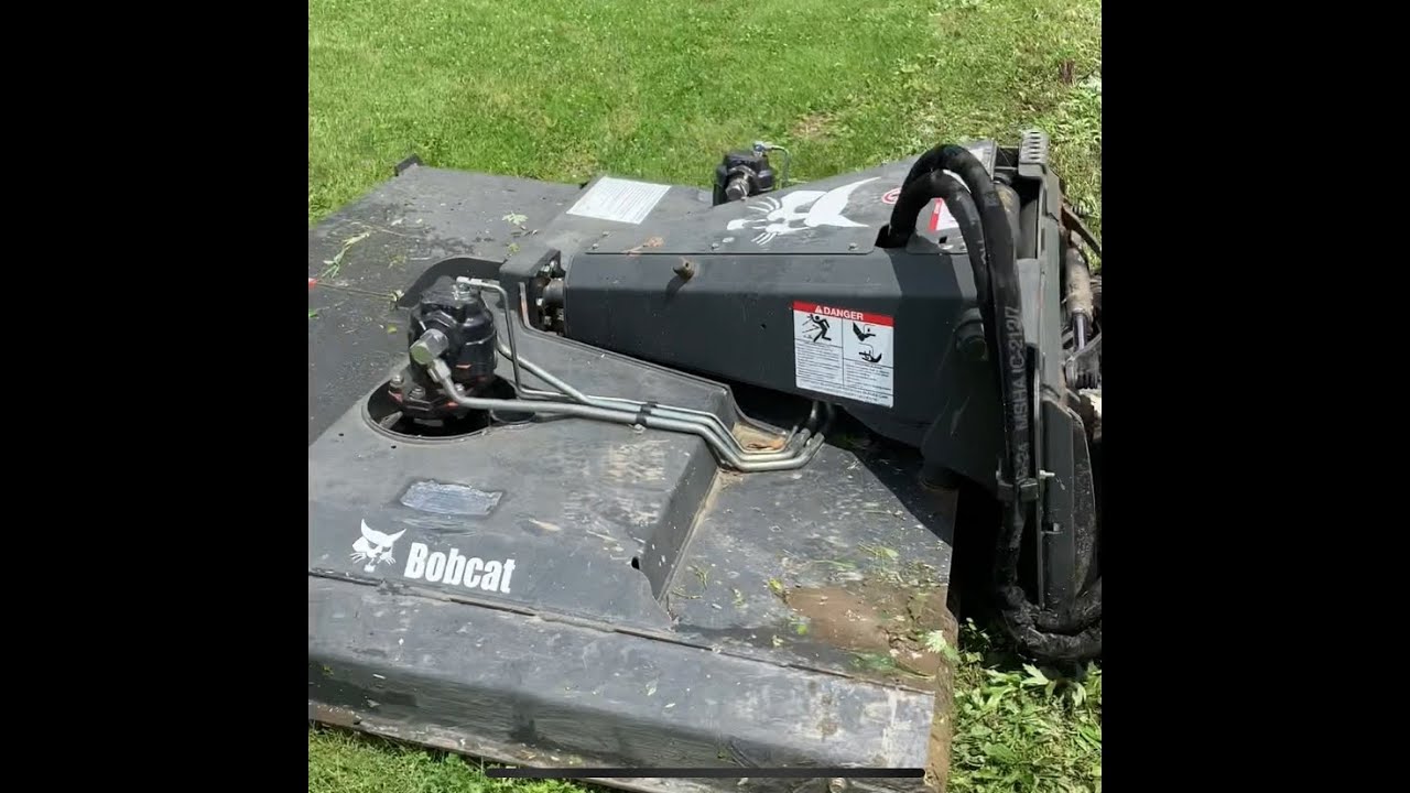 Mowing slopes with a T770 Bobcat.