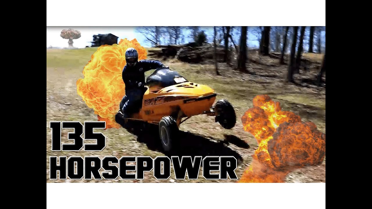 Snowmobile With Quad Wheels. Just because it's FAST