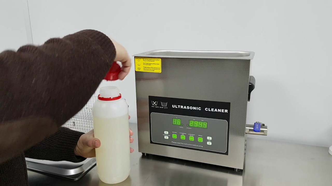 Maquina de limpieza por ultrasonidos para mecánicos