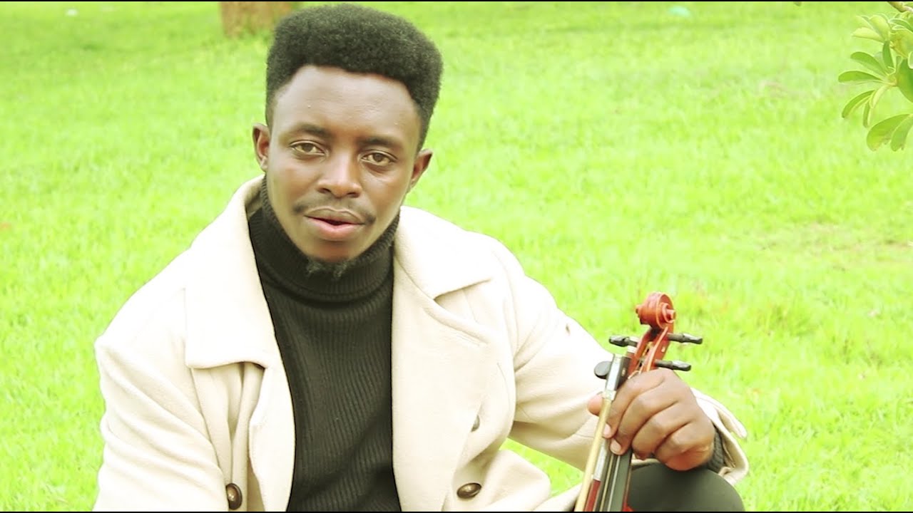 Denys_Nyagasani Mana yacu turakwemera  (composed by Saulve IYAMUREMYE official 4K Video)