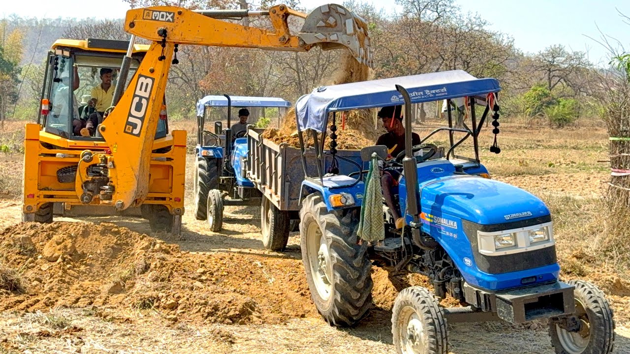 Tractor JCB JCB 3DX Loading Mud In Sonalika Tractor JCB 3DX Backhoes Loading Sonalika 35DI Working