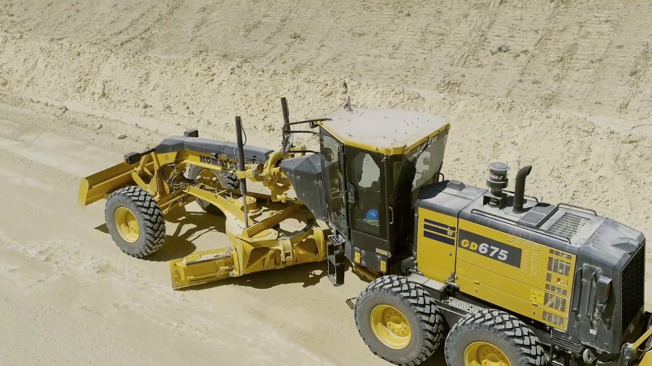 Komatsu GD675-7 Motor Grader in action