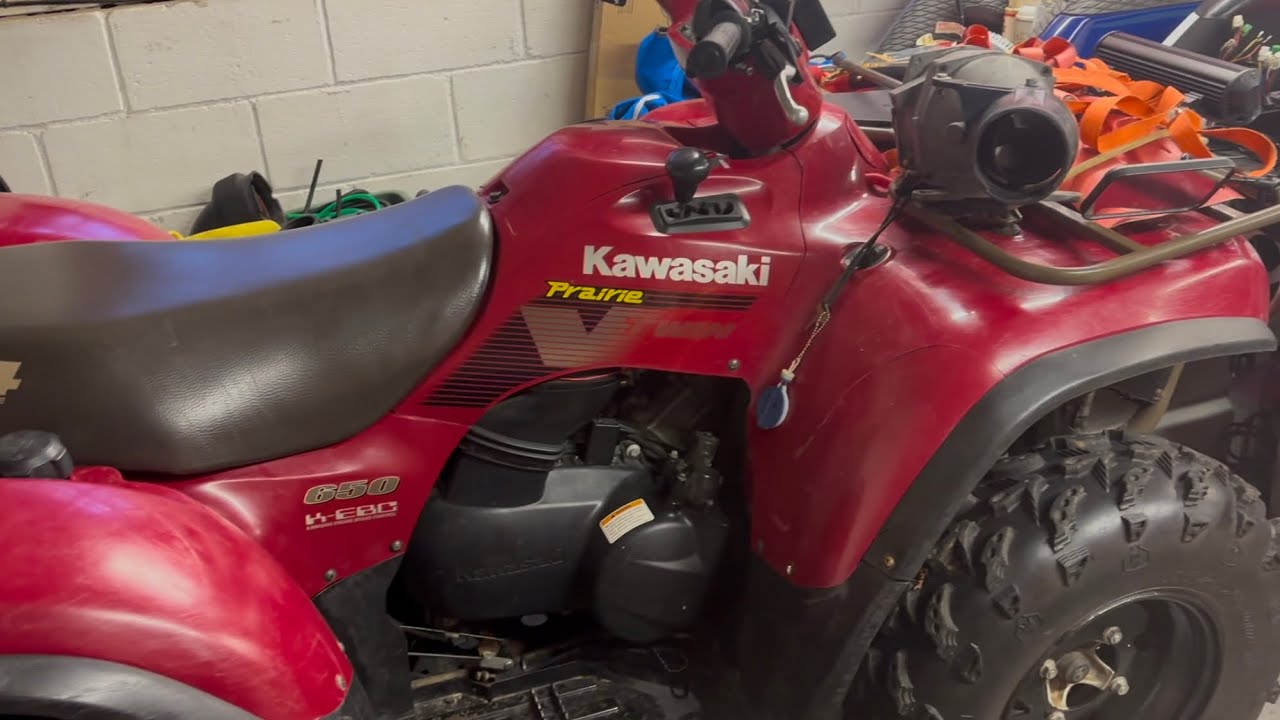 2003 Kawasaki Prairie 650 trouble shooting (carburetor cleaning and spark plug change)