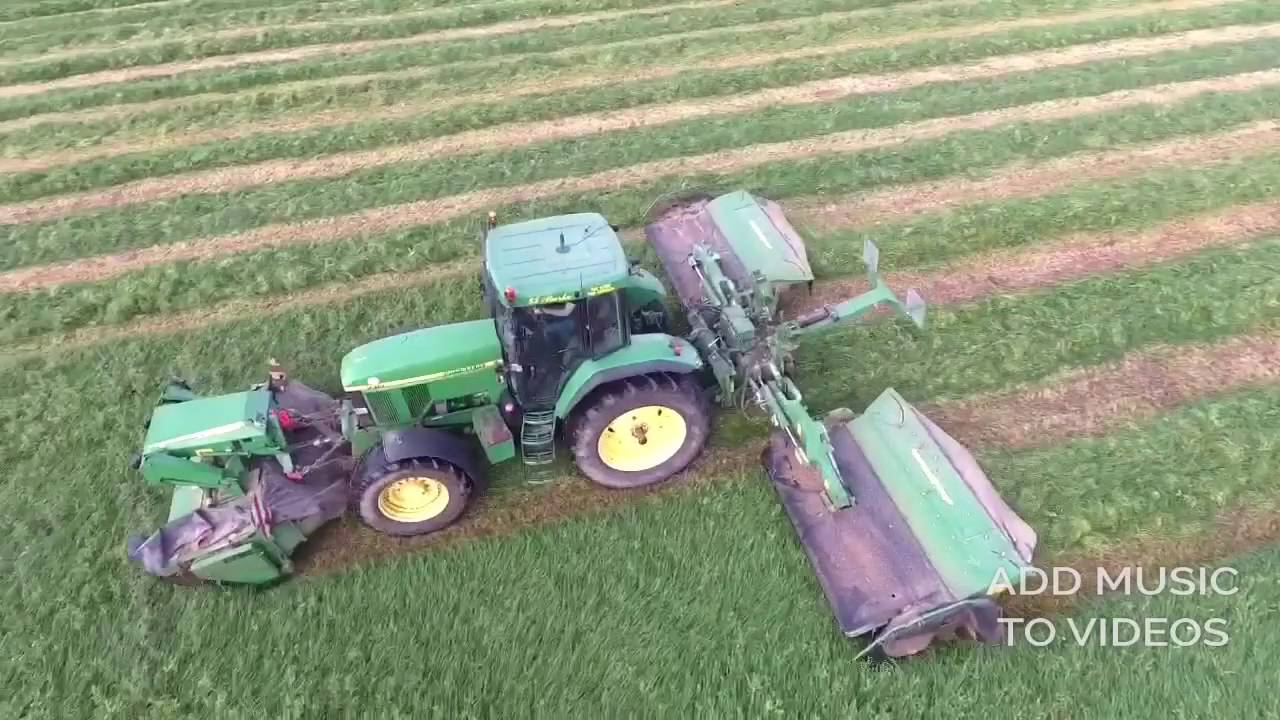 Mowing with jj burke & son Agri
