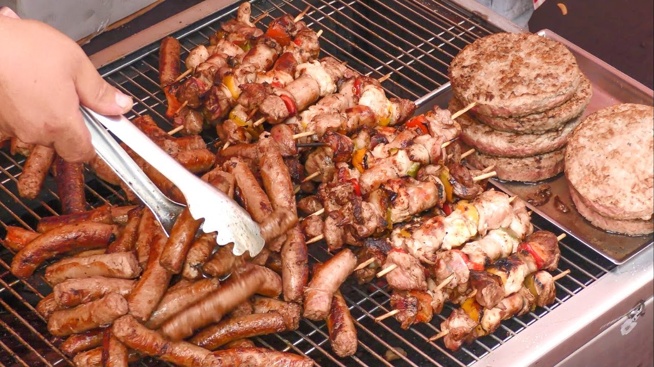 Italy Street Food. Grilling Sliced Beef, Burgers, Ribs, Sausages, Pasta, Sweets and more