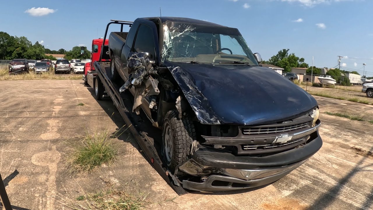 Chevy Silverado Hits Parked Amazon Van!