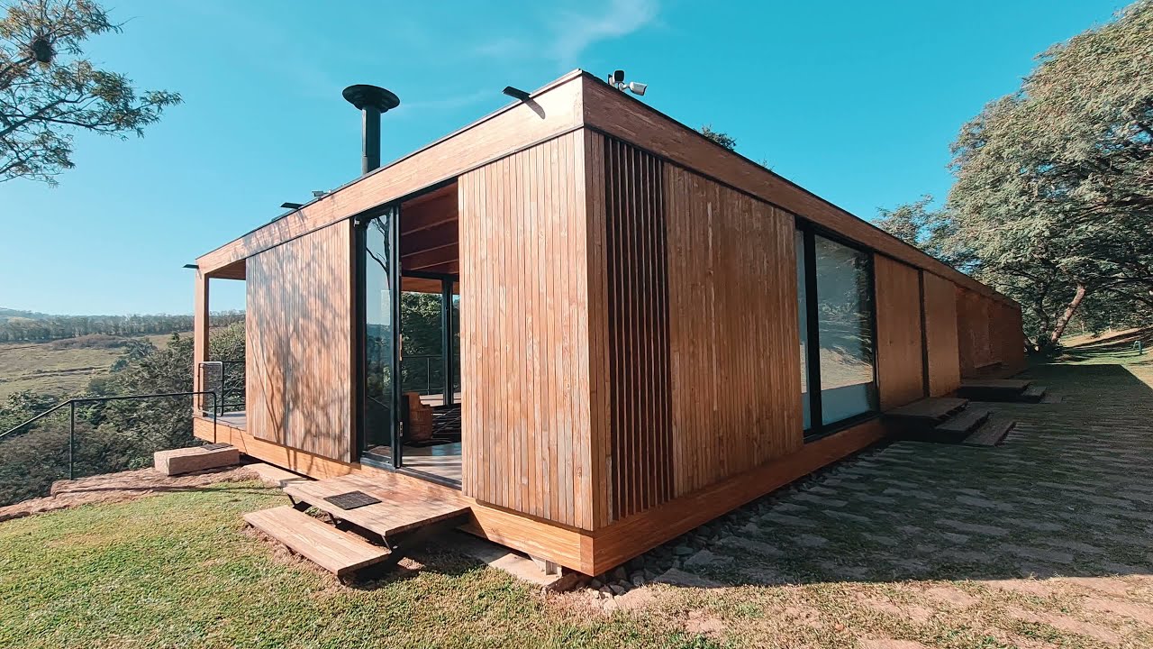 Visita numa Casa de Madeira construída com CLT e MLC