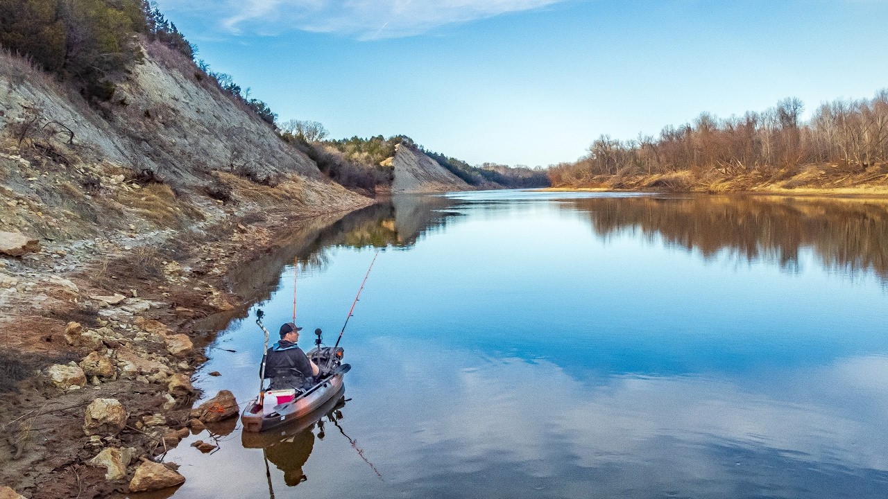 There’s a DARK MONSTER Swimming Below These River Bluffs!