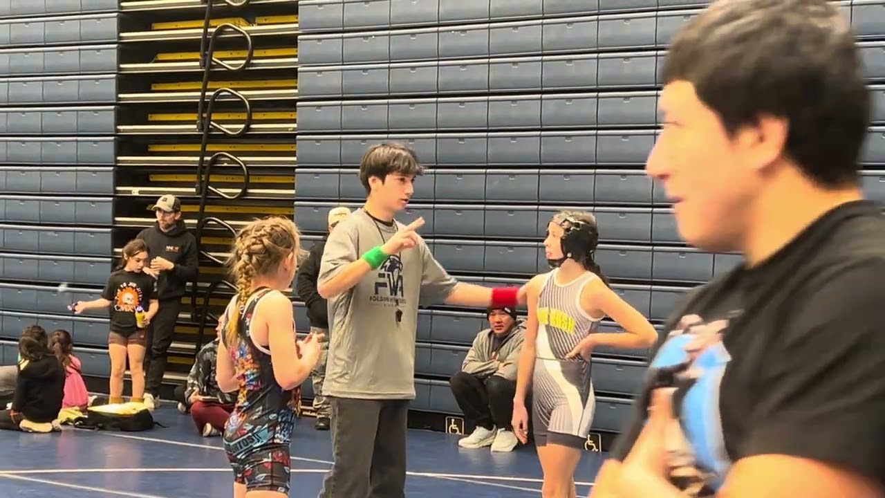 My daughter is a 4th grader wrestling middle.￼