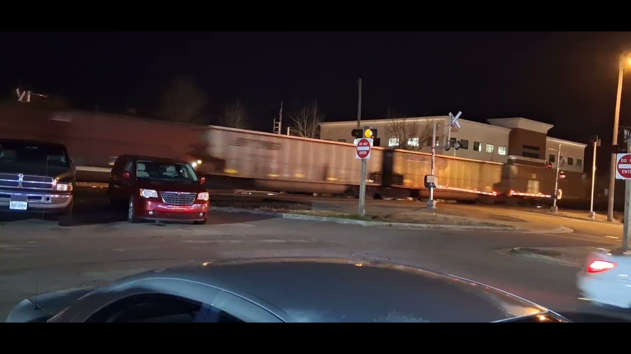 NS 9893 trails 810-01 across east washington street
