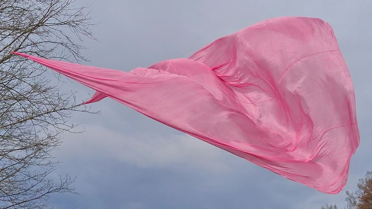 The delicate transparency of silk blowing in the breeze