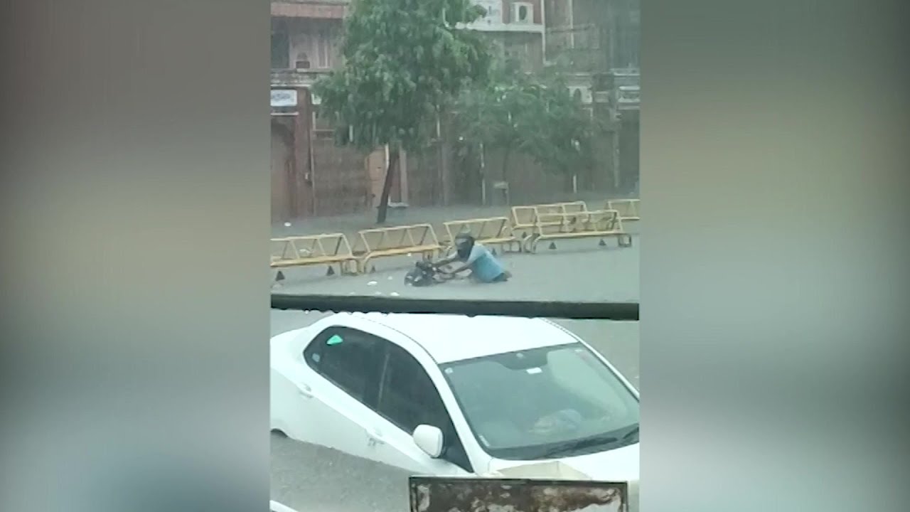 Submerged cars, flooded roads after heavy rains in northern India | AFP