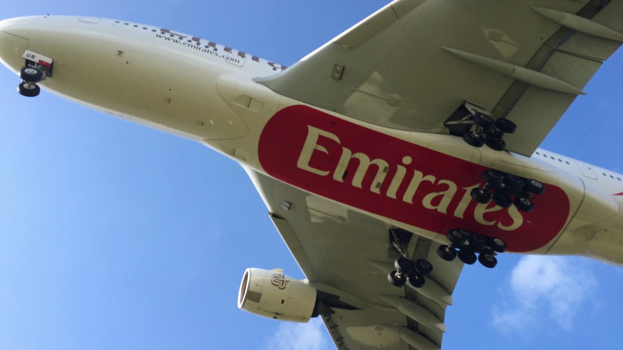 4K  Airbus A388 Emirates low pass and landing. Super Jumbo.