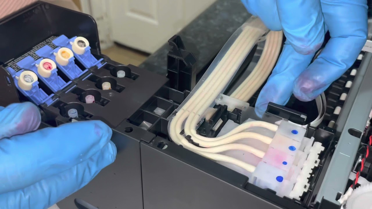 Removing/Replacing ink from an Epson Eco-Tank Printer.