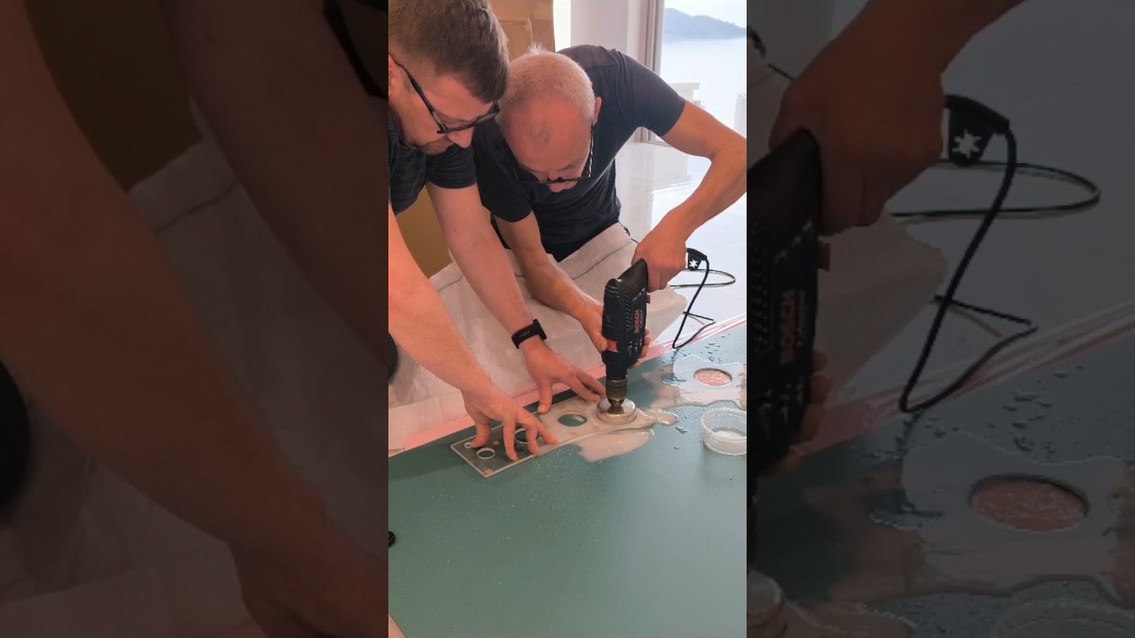 Drilling 2 holes in the mirror for lamps.  We work on site #drilling #mirror