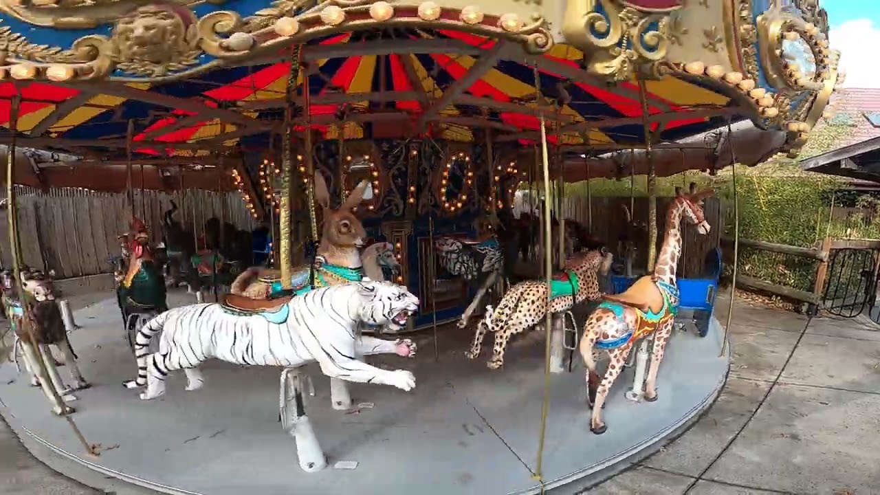 Cadence and Julia Ride the Carousel at the Knoxville Zoo