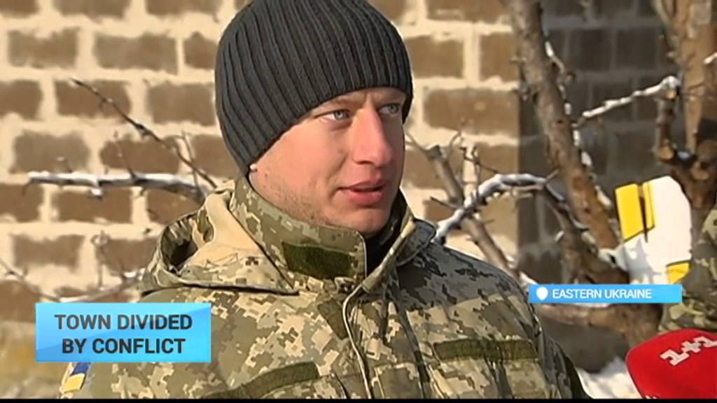 Tension in Novotroitske: Warring sides keep close watch over Ukrainian town near Donetsk