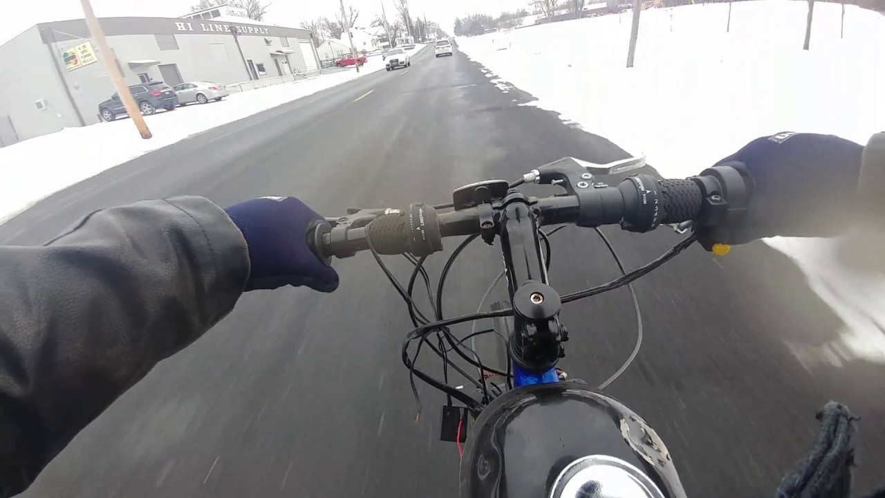 Its snowing! Lets ride a motorized bicycle. 66/80cc fat tire snow bike!