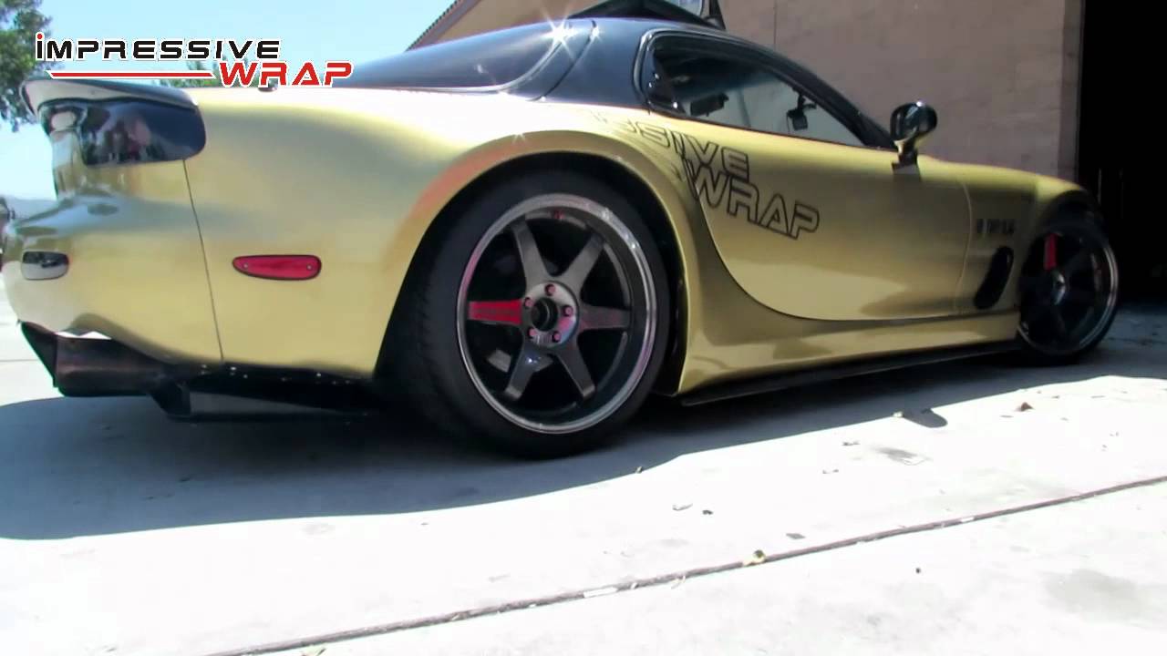 impressive wrap widebody RX7 wrapped in Gold Metallic