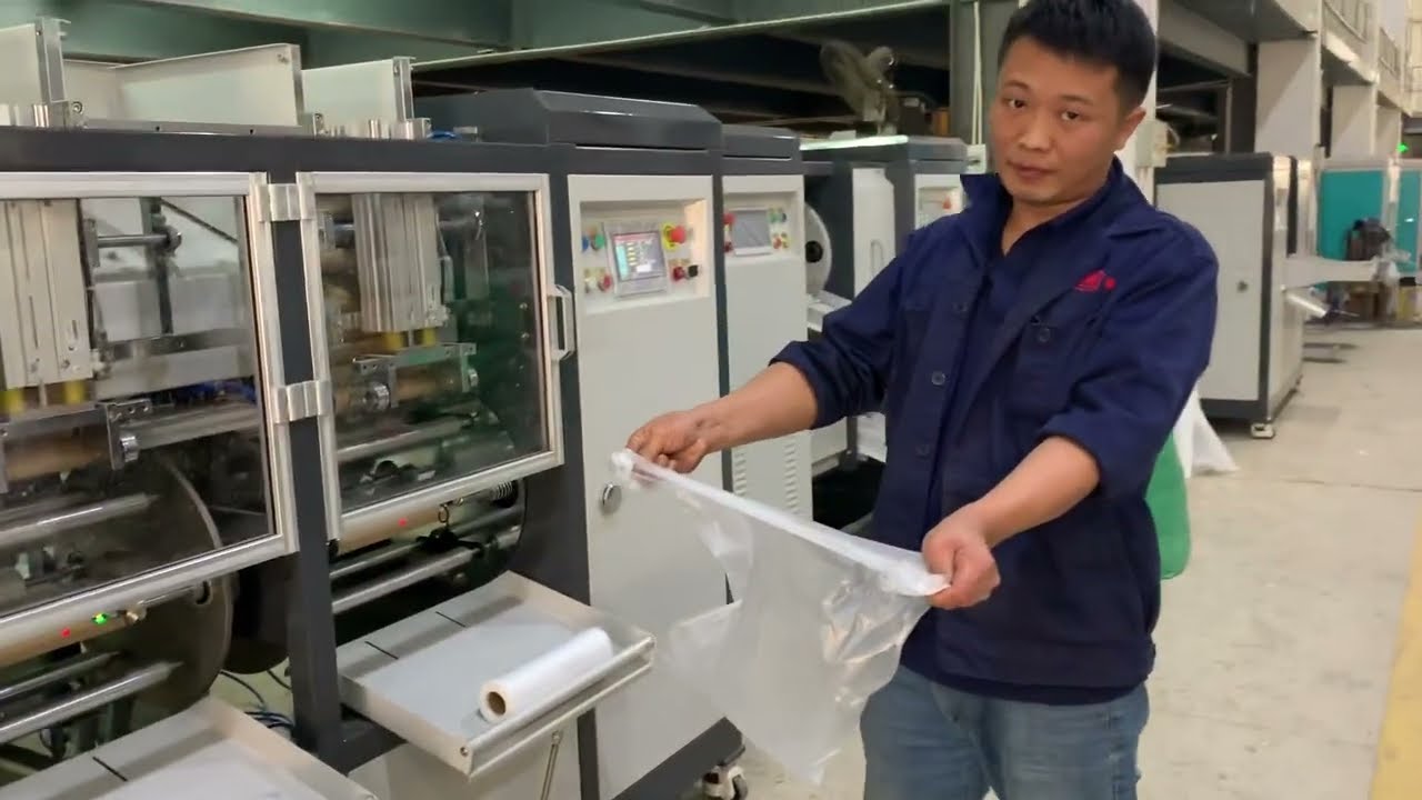 T-shirt bag on roll with core making machine  whatsapp:0086-13616770683