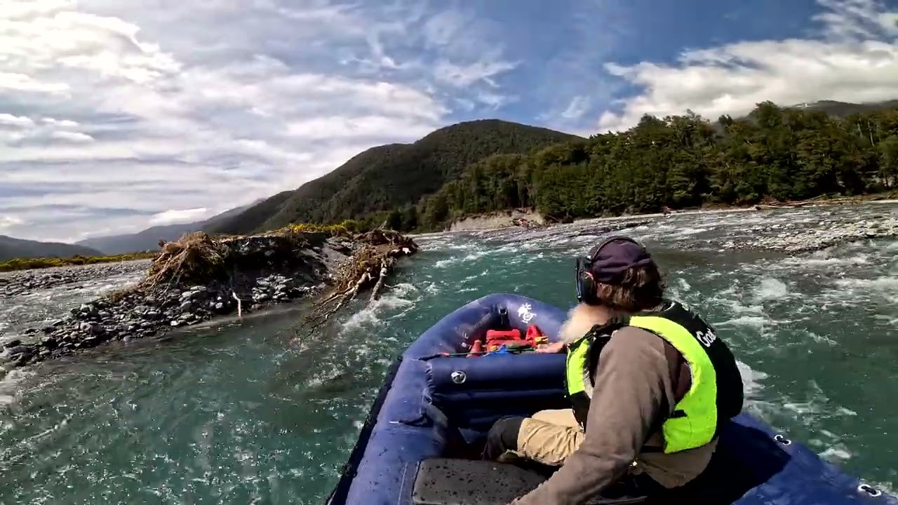 Heading up the Taramakau river in the 3.8m inflatable jetboat