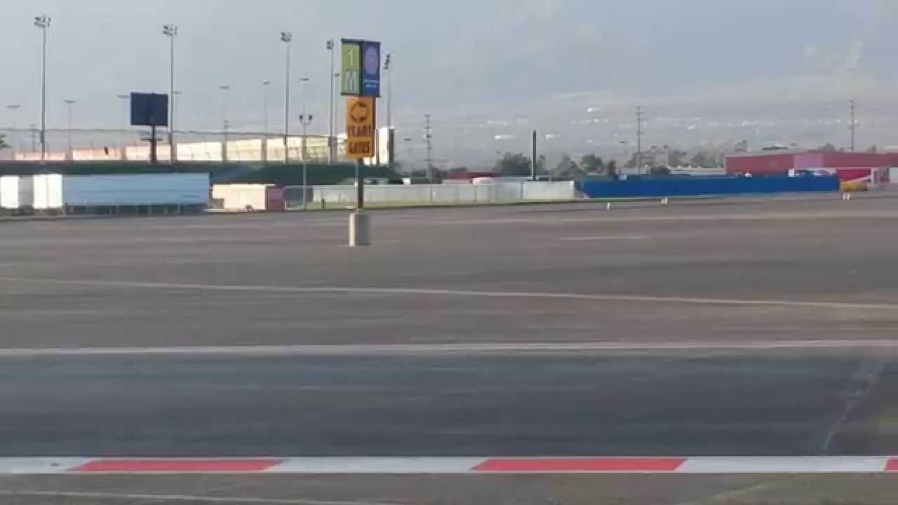 Drive a Fast Car on a Race Track  Auto Speedway Fontana California