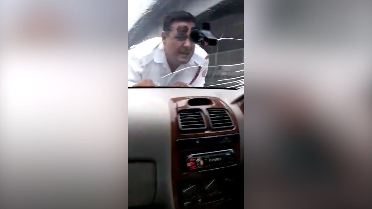 Watch: Delhi man forcibly carries traffic cop on car&rsquo;s bonnet for 2 km
