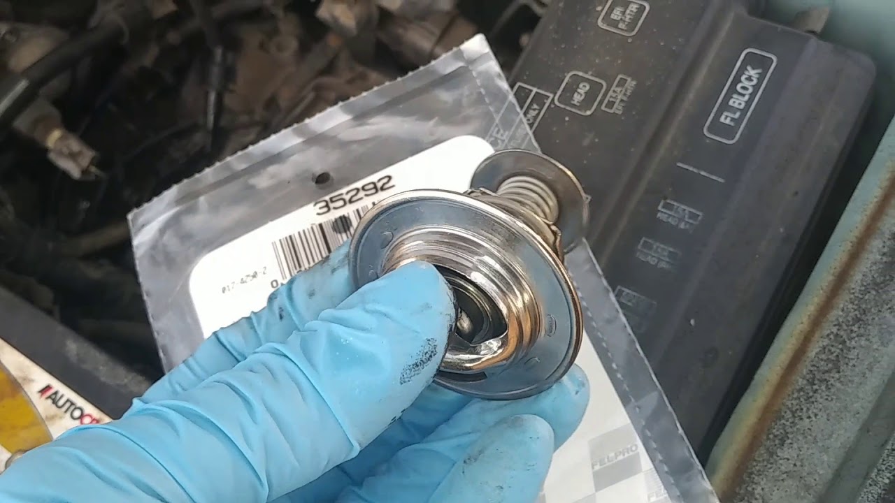 changing a thermostat on a corolla 95