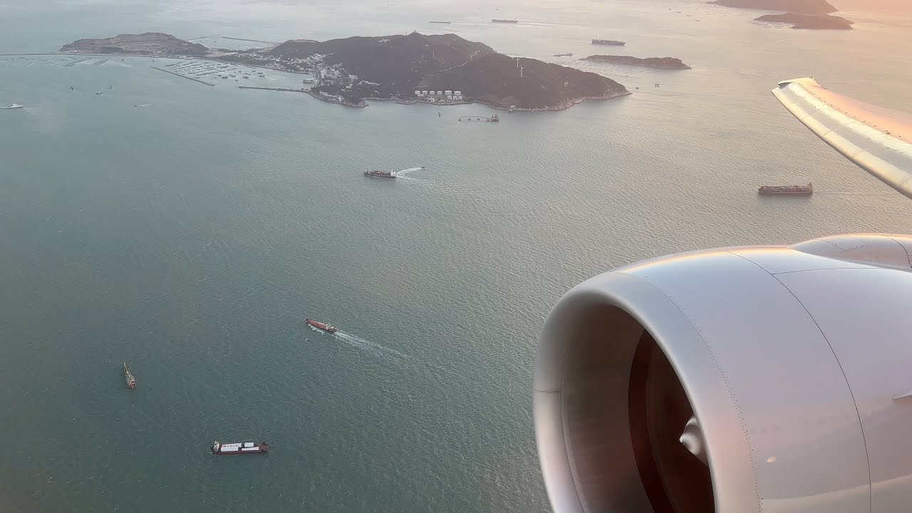 (4K) Full, unedited and spectacular sunrise approach and landing at Hong Kong International Airport
