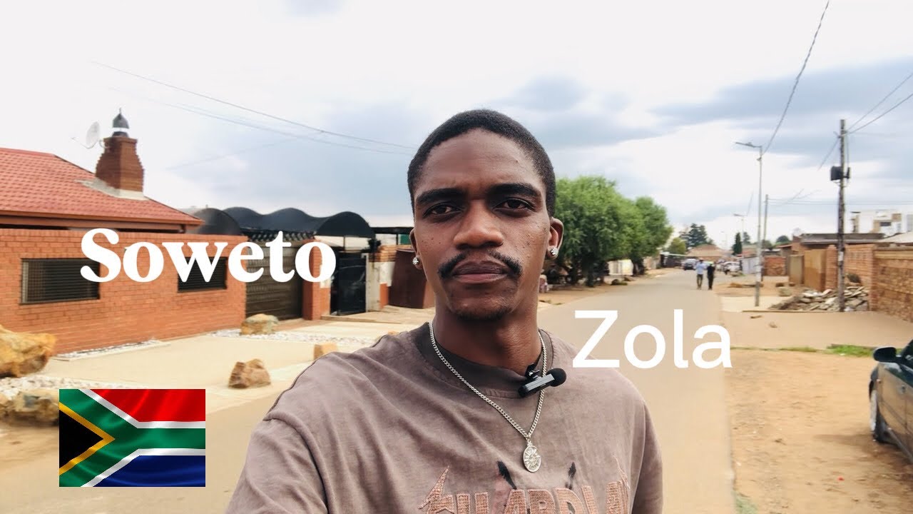 We’re Outside in the streets of Soweto, Zola 
