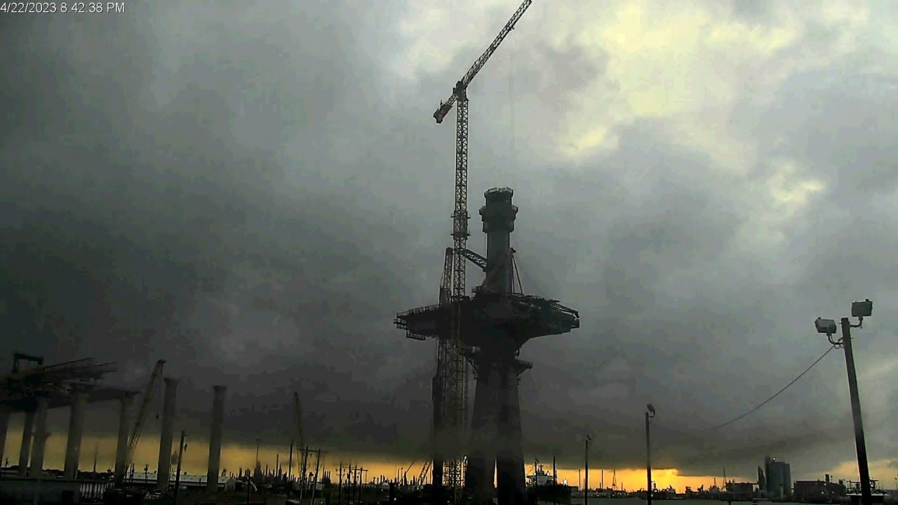 Surveillance footage shows Harbor Bridge tower crane fire, falling debris