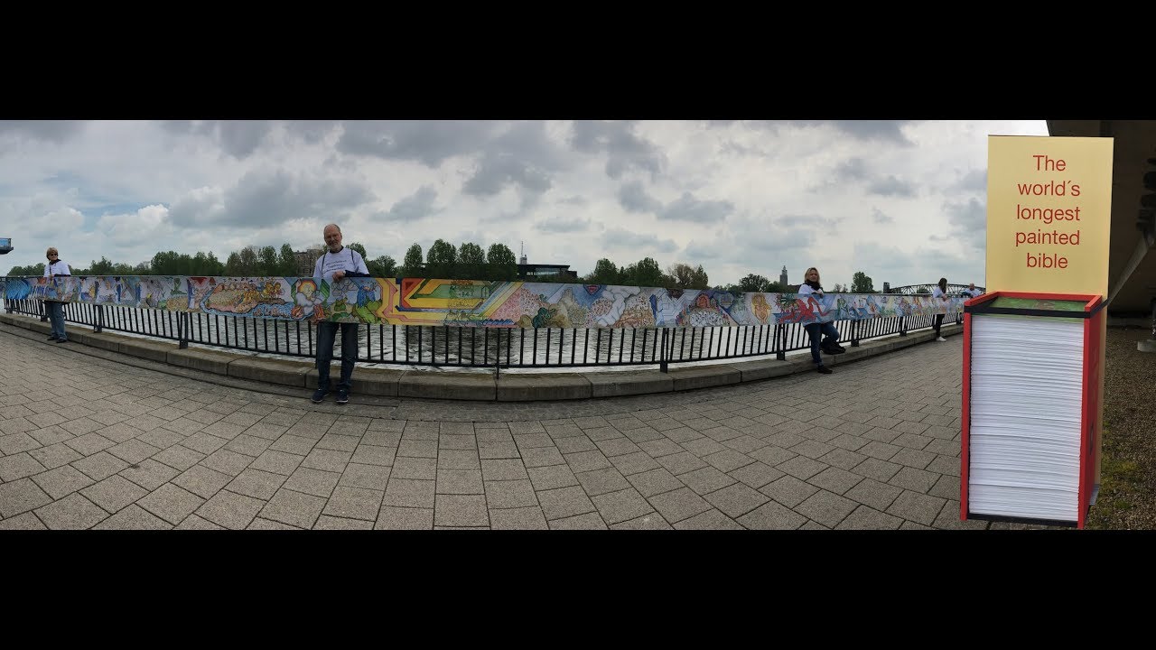 Unfolding the 1 mile long Bible setting a world record. Guiness Book of Records
