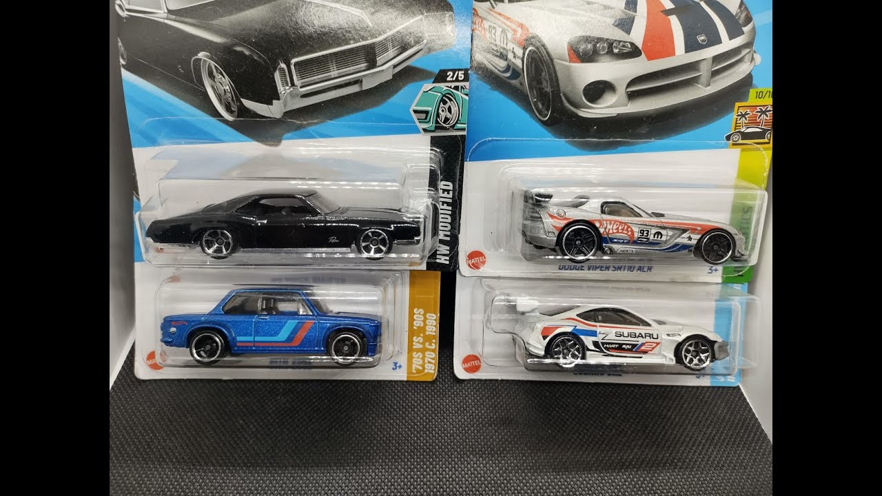 Распаковка случайных коллекционных фигурок Hot Wheels из моей коллекции в блистерной упаковке.