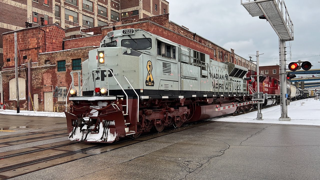 CP 7022 (Navy Vets Unit) leads CP 247 west through Milwaukee,WI